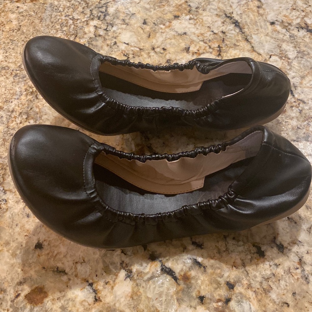 Black leather ballet flats